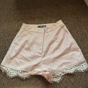 Medium, size 2. Pink shorts with laceline on the bottom.